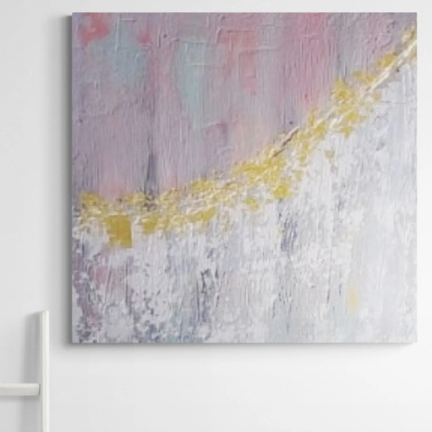 Unicorn Dreams hanging in a furnished room
