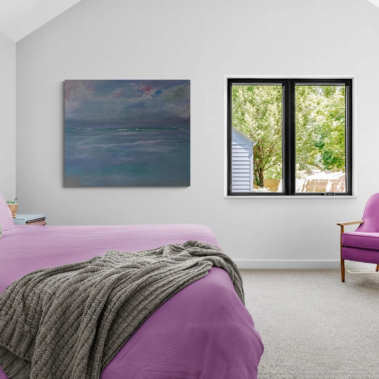 Pink Skies hanging in a furnished room